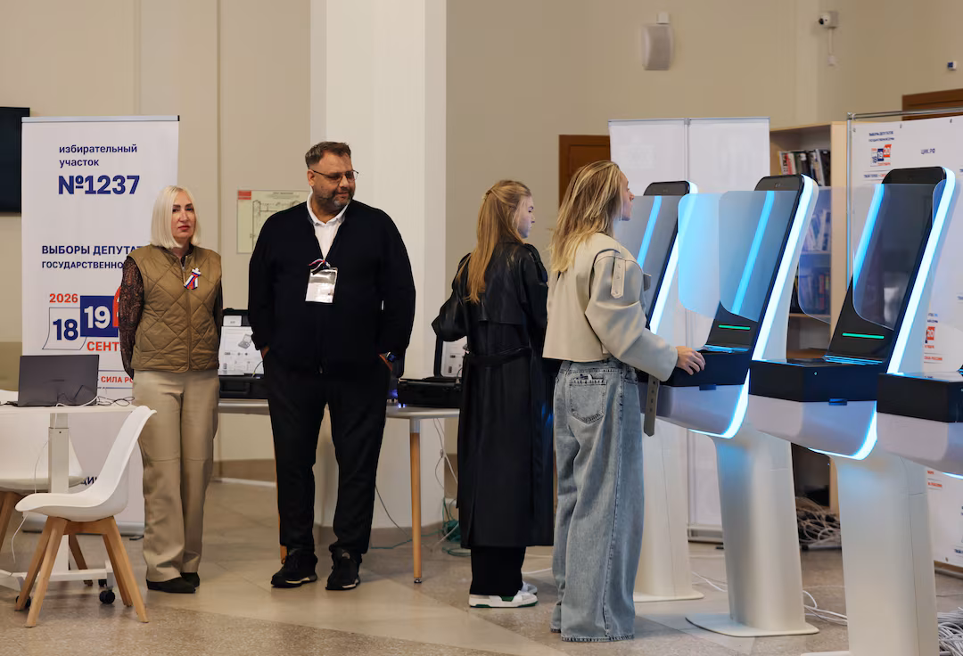 Russians participate in an election that Putin views as a measure of backing for his military actions