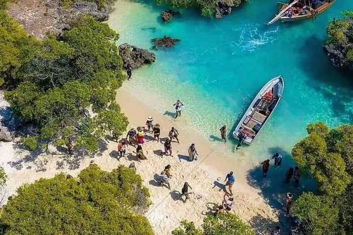 Drone View: Tourists Arrive at Zanzibar's Hidden Cove