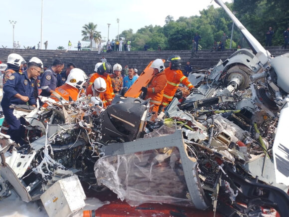 Two Navy helicopters collide during a military practice in Malaysia, leaving ten people dead