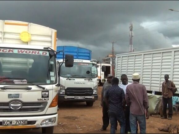 Tons of potatoes on Kenyan lorries are delayed at the border as Uganda increases a tax