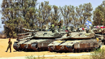 Israel occupies Gaza’s whole Egyptian border and advances into Rafah through raids