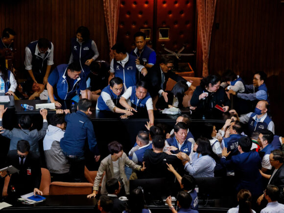 Lawmakers in Taiwan trade punches in a fierce disagreement over parliamentary reforms