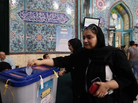 Iran elects a new president despite voter disinterest and growing pressure