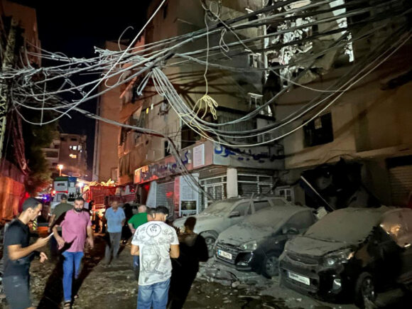 Israel struck a suburb of Beirut, killing a prominent commander, according to Hezbollah