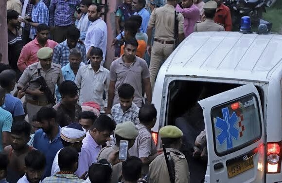 India suspends six officials for their carelessness during a deadly stampede at a religious gathering