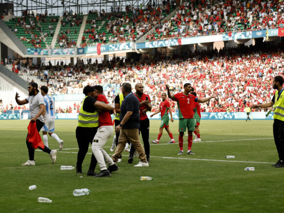 Morocco defeated Argentina 2-1 in a wild first game, while France easily won