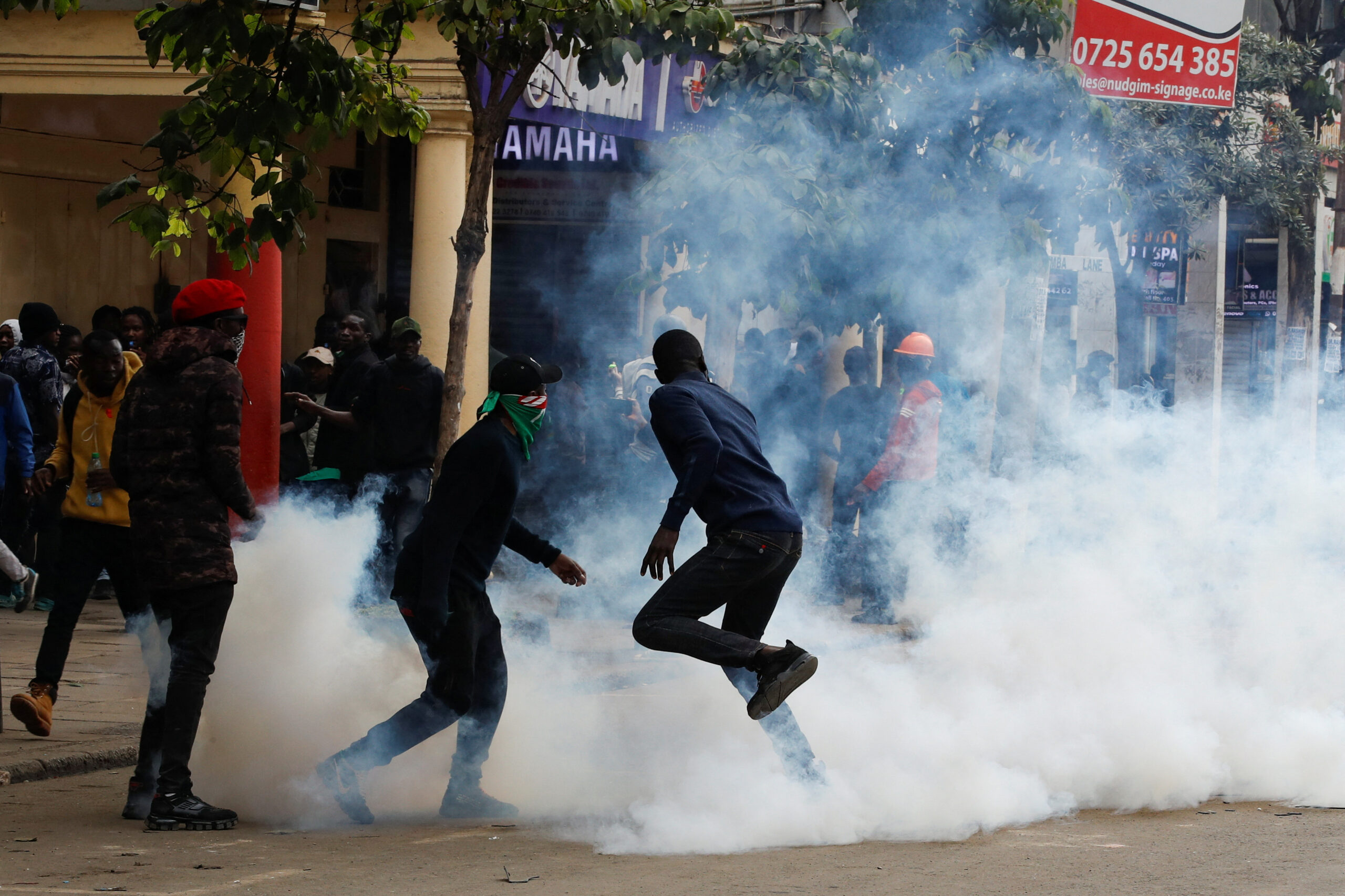 Kenyan demonstrators chant “Ruto must go” while using tear gas, stones, and torches