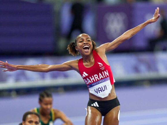 Bahraini Winfred Yavi, who was born in Kenya, wins the steeplechase gold medal