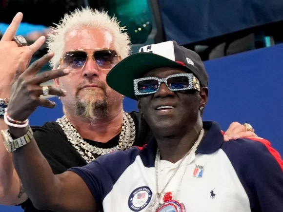 “Best Hype Man in the World” Guy Fieri teams up with Flavor Flav to support the U.S. women’s water polo team