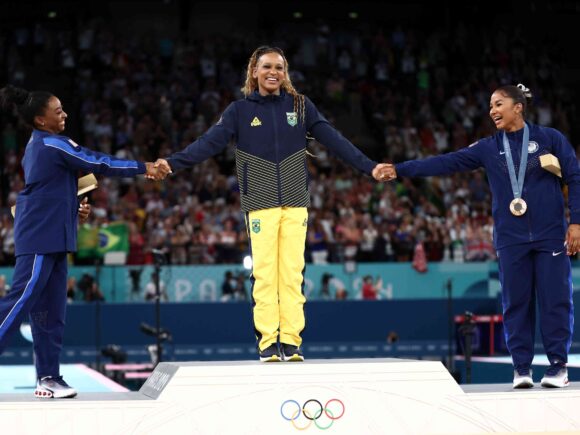 “Very exciting,” say Simone Biles, Rebeca Andrade, and Jordan Chiles as they celebrate the first all-black gymnastics podium