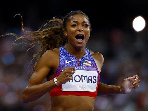 Track star Thomas wins her first-ever 200-meter world championship