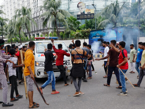 Curfew is in place as fighting rocks Bangladesh, killing at least 91 people