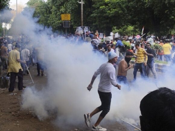 The Indian police have fired tear gas at hundreds of protesters in Kolkata who are questioning the rape and murder of a doctor