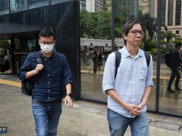 Two editors are sent to jail in Hong Kong in a major case of sedition