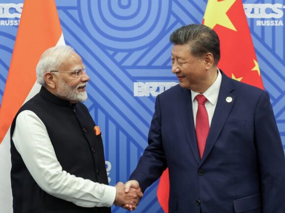 Xi tells Modi at the BRICS meeting that China and India should work out their differences