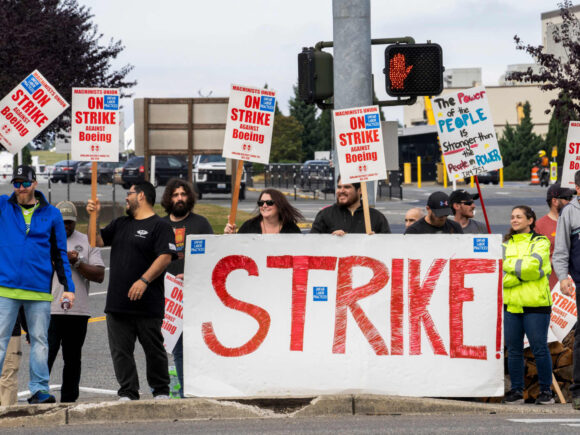 Workers at Boeing vote on a new contract that will end their seven-week strike