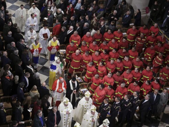 As Notre-Dame emerges from the fire’s rubble, first responders and restorers receive applause