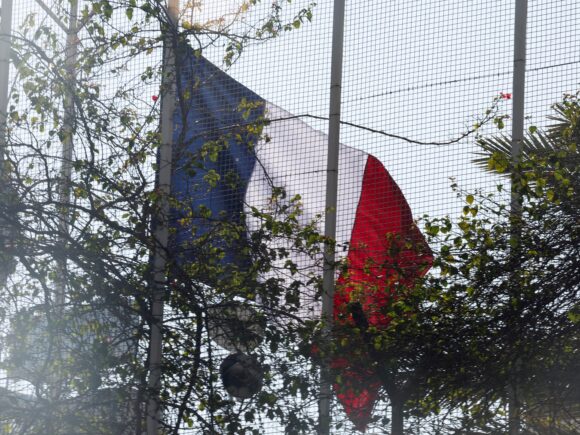 France delivers the flag to the embassy in Damascus as new Syrian officials establish communication with the West