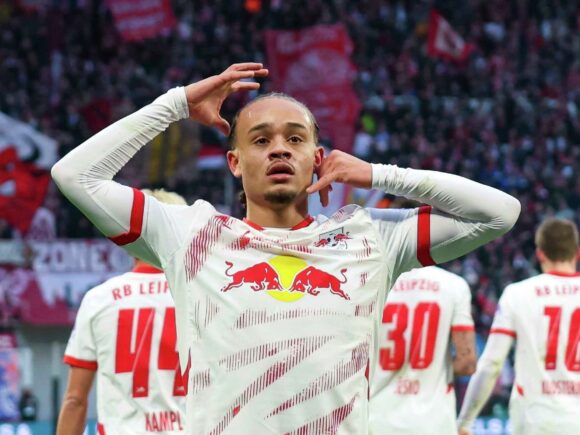 Simons of Leipzig scores twice as Klopp looks on