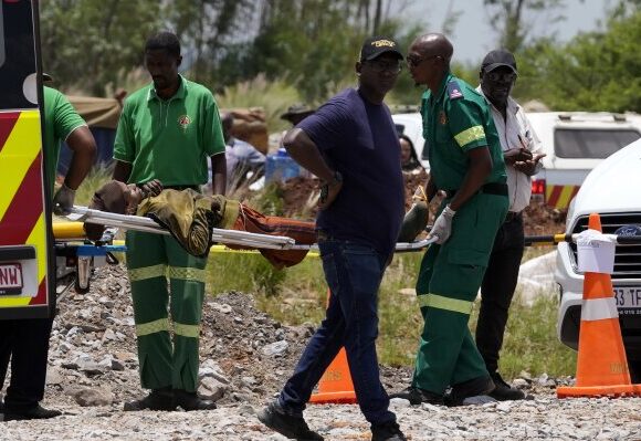 South African police are searching for the gang boss of an illicit mine that killed dozens of people