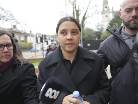 Australian soccer star Kerr claims that she was treated differently by UK police during a racism trial