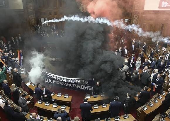 Parliament in Serbia Breaks Out in Chaos as Opposition Uses Smoke Grenades