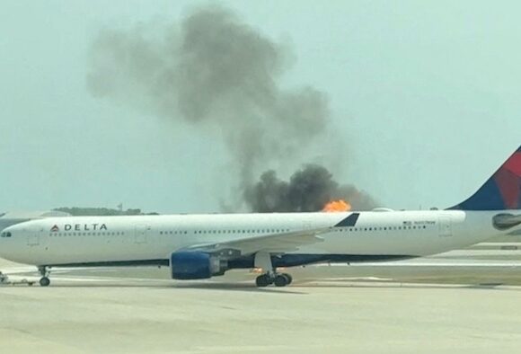 Delta flight experiences fire on runway in Orlando; passengers evacuated using emergency slides
