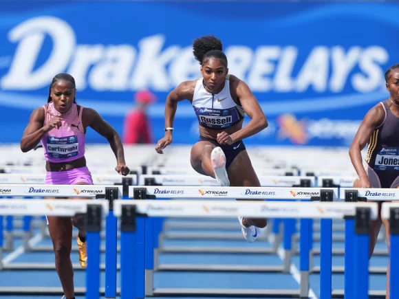 Russell sets a new American record in the Grand Slam Track 100-meter hurdles
