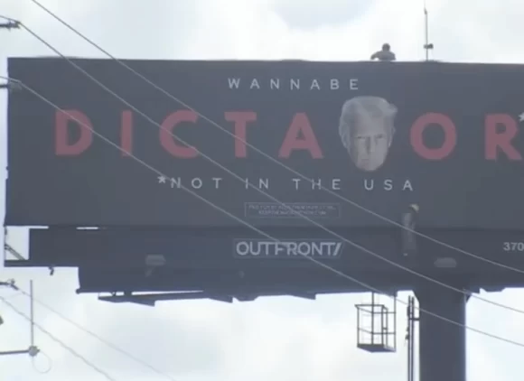 A billboard calling Trump a “Wannabe Dictator” is put up in South Florida
