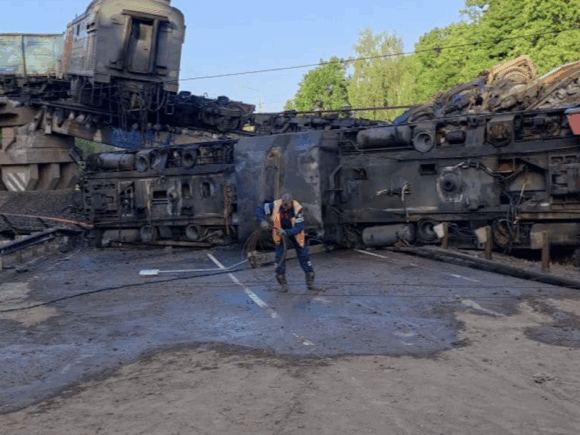 Seven people die and dozens are hurt when a bridge in western Russia falls on a train