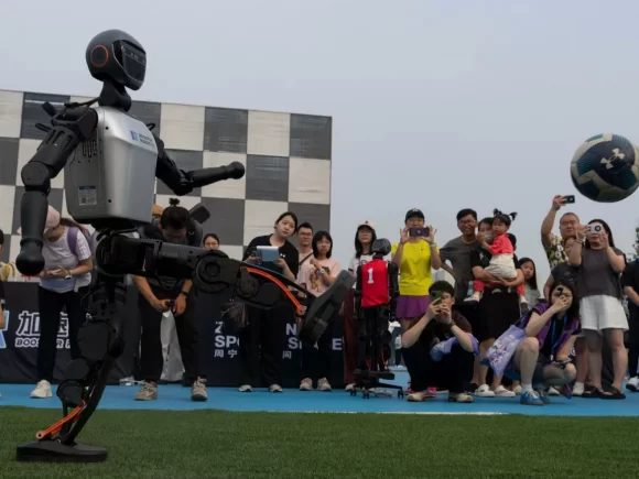 Chinese Robots Participate in AI-Powered Football Match