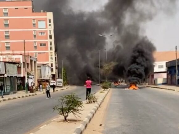 Four people are killed and hundreds are arrested as violent protests against the hike in fuel prices break out in Angola