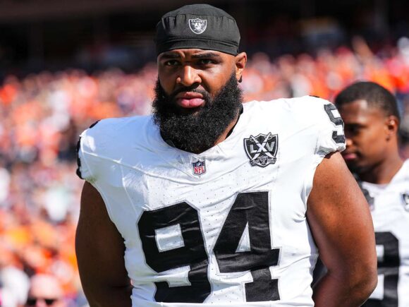 Christian Wilkins was cut by the Raiders after a teammate complained about a kiss in the locker room