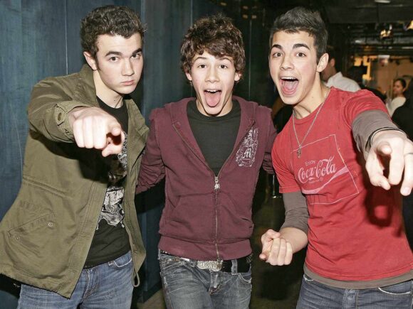 The Jonas Brothers “felt the pressure” to follow the rules of the Purity Ring