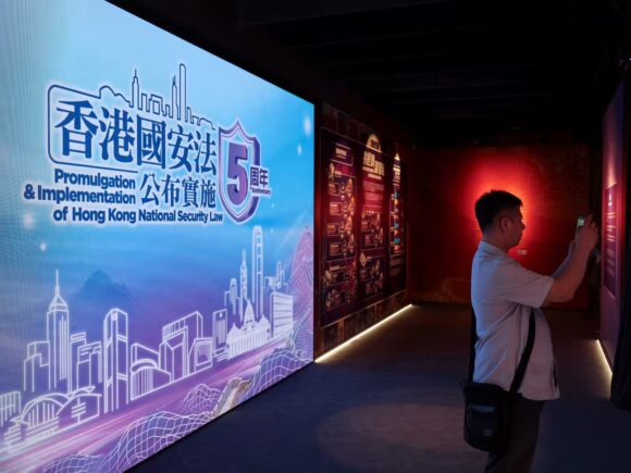 Hong Kong places bounties on 15 foreign activists and issues arrest warrants for 19 of them