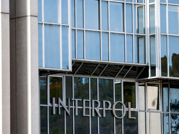 Nigeria and Interpol collaborate to extradite a wanted Chinese gang leader