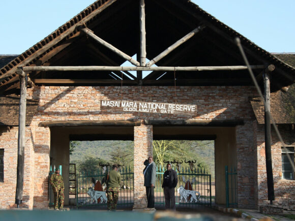 A Kenyan protester attempts to prevent the opening of a new Ritz-Carlton safari lodge