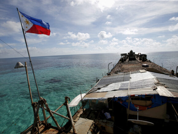 The Philippines warns of an inevitable Taiwan conflict and pledges to defend the South China Sea amid tensions with China
