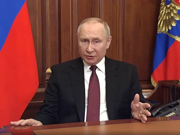 Putin warns of the military option but says the war in Ukraine may be resolved through negotiations