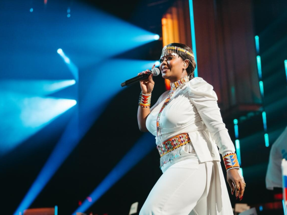 Kenya’s Sanaipei Tande raises the country’s flag high at the Intervision contest in Russia