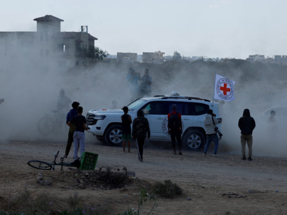 Israel permits Egyptian and Red Cross workers to enter Gaza as the search for hostage bodies continues