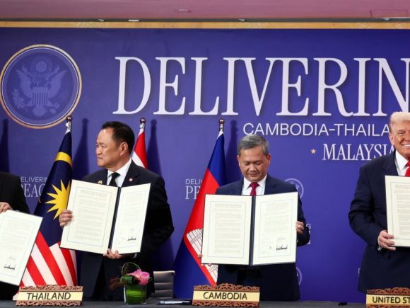 Trump leads a rush of trade agreements and truce signings during his first Asian visit