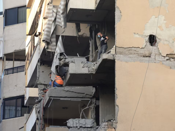 Israel strikes Beirut and kills a Hezbollah military leader