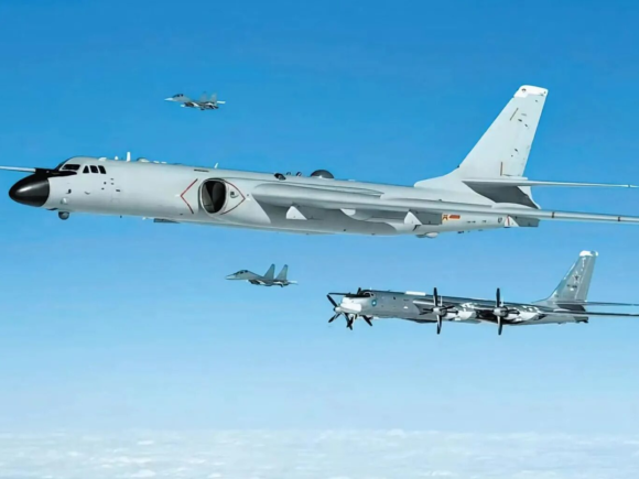 Russian and Chinese bombers carry out a joint patrol near Japan as tensions escalate