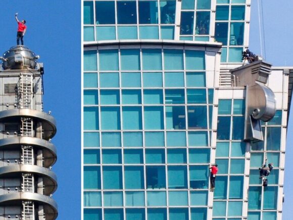 Climber scales in the US Taipei 101, the tallest structure in Taiwan without ropes