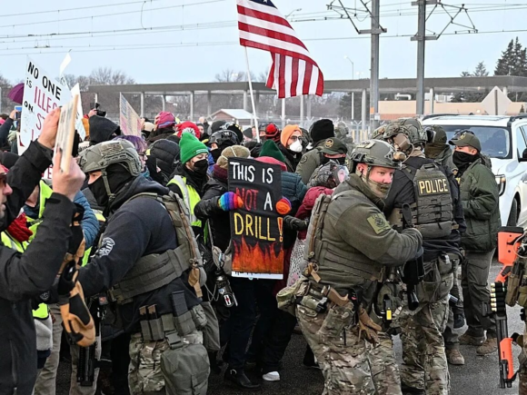 Protests break out in Minneapolis after a woman is fatally shot by an ICE agent