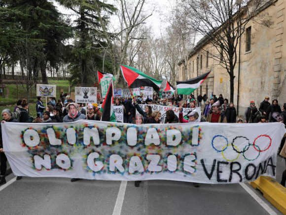 Hundreds of people gathered in Verona to protest prior to the closing ceremony of the Olympics