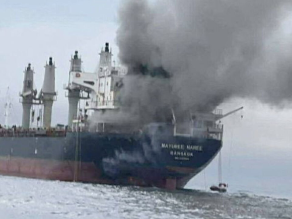 A cargo ship is on fire in the Strait of Hormuz following an incident where three vessels were hit by unidentified projectiles