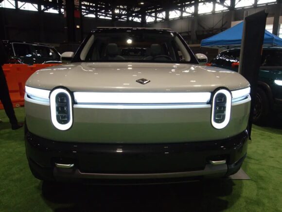 Uber plans to invest as much as $1.25 billion in Rivian in connection with a robotaxi agreement