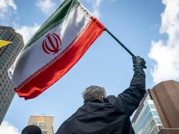 Iran warns of a severe reaction should the US continue its assaults, while oil prices fluctuate